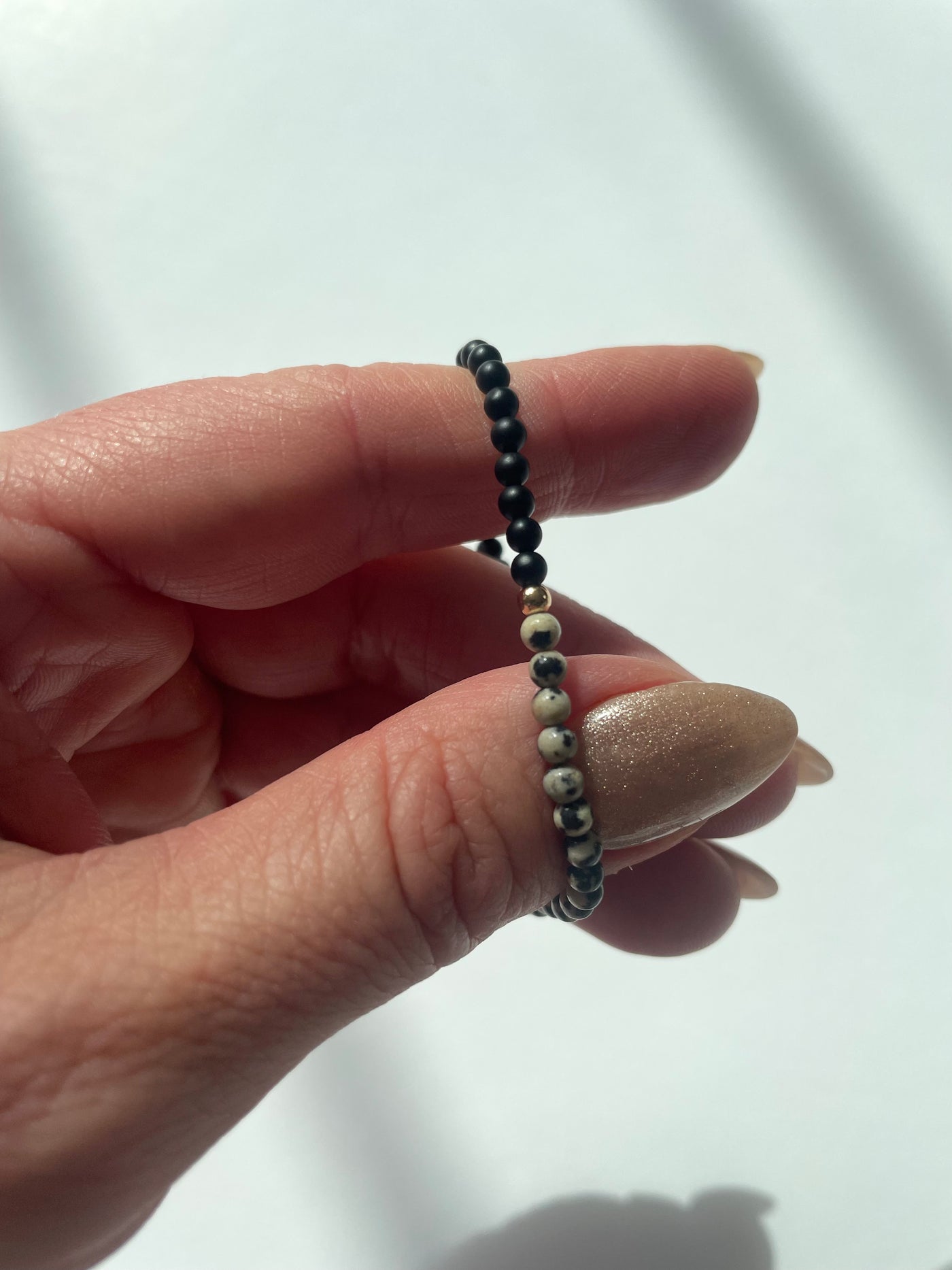 Dalmatian Stone and Matte Onyx Duality Bracelet
