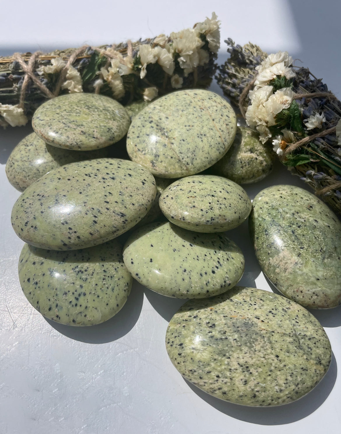 Black Spotted Onyx Palm Stone
